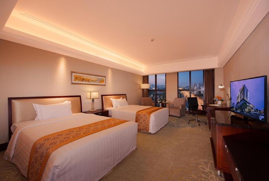 קונשאן Shuguang International Hotel Kunshan מראה חיצוני תמונה