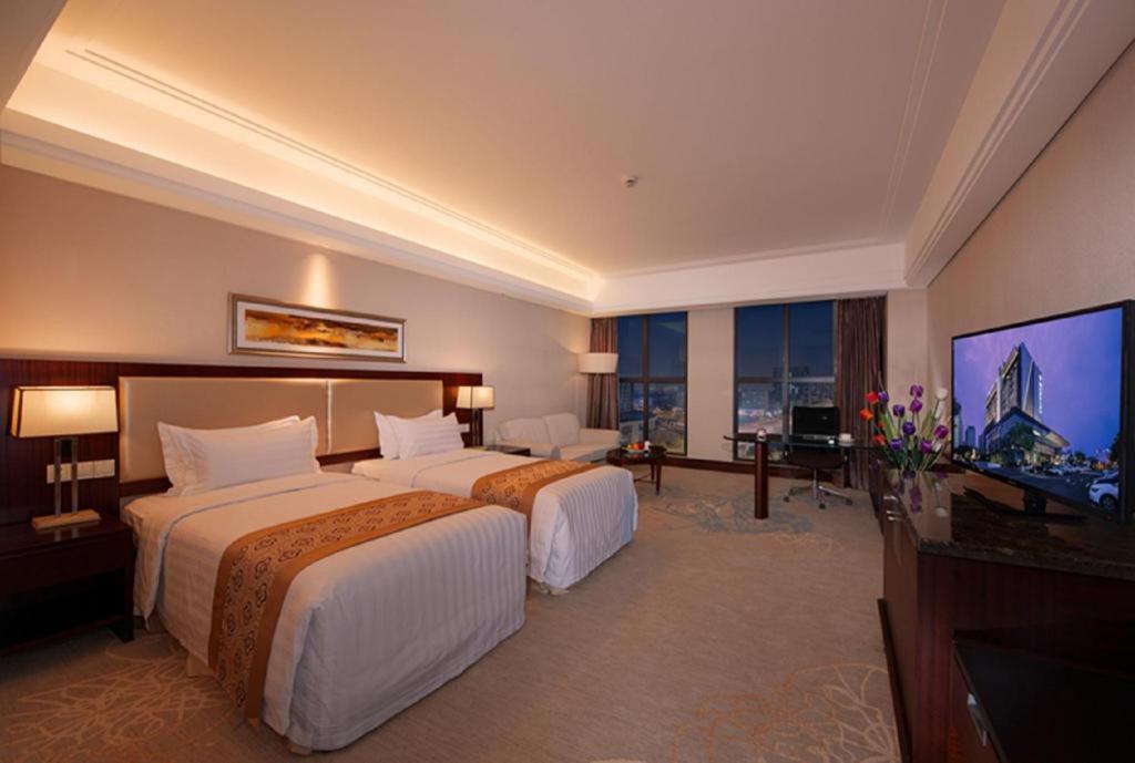 קונשאן Shuguang International Hotel Kunshan מראה חיצוני תמונה